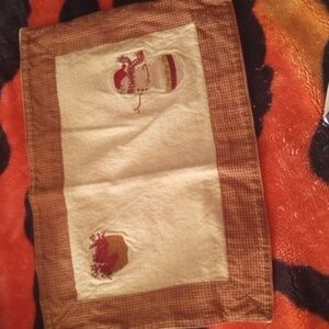 Hand embroidered placemat